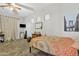 Cozy bedroom with wood floors, natural light, and a comfortable bed at 2213 E Constance Way, Phoenix, AZ 85042