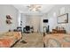 Spacious bedroom featuring two beds, a ceiling fan, and stylish decor at 2213 E Constance Way, Phoenix, AZ 85042