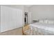 Bedroom with a large closet, natural light, and a cozy bed at 2213 E Constance Way, Phoenix, AZ 85042