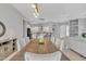 Dining area with tile floors, modern lighting, and an open layout at 2213 E Constance Way, Phoenix, AZ 85042