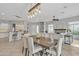 Open floorplan featuring dining area, living space, and a modern light fixture at 2213 E Constance Way, Phoenix, AZ 85042