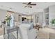 Inviting open-concept living space with tile floors, a dining area, and natural light at 2213 E Constance Way, Phoenix, AZ 85042