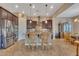 Stylish kitchen island with bar seating, pendant lighting, and stainless steel appliances at 2254 E Tomahawk Dr, Gilbert, AZ 85298