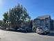 Exterior view of well-maintained condo complex with ample parking at 255 S Kyrene Rd # 115, Chandler, AZ 85226
