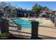 Community swimming pool with lounge chairs and shade at 255 S Kyrene Rd # 115, Chandler, AZ 85226