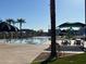 Community pool and splash pad with shaded picnic areas at 255 S Kyrene Rd # 115, Chandler, AZ 85226