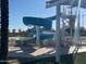 Community pool area features a thrilling water slide at 255 S Kyrene Rd # 115, Chandler, AZ 85226