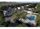 Aerial view of the community showcasing lush landscaping, pool, and well-maintained homes in a desirable location at 2604 N 27Th St # 4, Phoenix, AZ 85008
