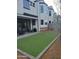 Beautiful backyard with green turf and an outdoor seating area at 2604 N 27Th St # 4, Phoenix, AZ 85008