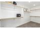 Walk-in closet with custom shelving and ample storage space for clothes and accessories at 2604 N 27Th St # 4, Phoenix, AZ 85008