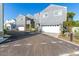 Exterior view of a modern home featuring a two-car garage and gray siding at 2604 N 27Th St # 4, Phoenix, AZ 85008