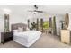 Spacious main bedroom with a vaulted ceiling, neutral decor, and a large window at 2604 N 27Th St # 4, Phoenix, AZ 85008
