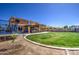 The spacious backyard includes a lush lawn, covered patio, and landscaping, making it ideal for relaxation and recreation at 3016 N Glenview --, Mesa, AZ 85213