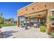 The backyard is an entertainer's dream, featuring a covered patio, built-in bar, and lush landscaping at 3016 N Glenview --, Mesa, AZ 85213