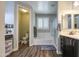 Spacious bathroom featuring dual sinks, and a separate toilet and bath/shower enclosure at 3016 N Glenview --, Mesa, AZ 85213