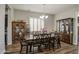 Elegant dining room featuring hardwood floors, a chandelier, and ample space for entertaining guests at 3016 N Glenview --, Mesa, AZ 85213