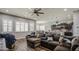 Spacious living room with a ceiling fan, adjacent to the kitchen, perfect for modern living and entertaining at 3016 N Glenview --, Mesa, AZ 85213