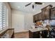 Office featuring built-in dark wood cabinets and desk area with plantation shutters at 3016 N Glenview --, Mesa, AZ 85213