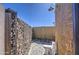 Enjoy the privacy of an outdoor shower enclosed with a unique rock wall detail, perfect for rinsing off after a swim at 3016 N Glenview --, Mesa, AZ 85213