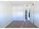 View of bedroom with a closet and access to a bathroom; offers comfort and functionality at 3434 E Baseline Rd # 213, Phoenix, AZ 85042