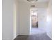 Inviting living room with plush carpeting, fresh white paint, and lots of light at 3434 E Baseline Rd # 213, Phoenix, AZ 85042