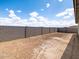 The backyard is enclosed with a block wall and has a level area at 4029 S 176Th Dr, Goodyear, AZ 85338