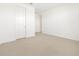 This bedroom has a light colored carpet and neutral-painted walls at 4029 S 176Th Dr, Goodyear, AZ 85338