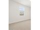 Bright bedroom featuring neutral carpet and natural light from the window at 4029 S 176Th Dr, Goodyear, AZ 85338
