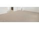 Living room featuring neutral carpet and white walls at 4029 S 176Th Dr, Goodyear, AZ 85338