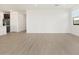 Bright living room with wood floors and natural light at 4029 S 176Th Dr, Goodyear, AZ 85338