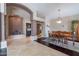 Spacious dining area with built-in bar and seamless flow to additional living spaces at 4628 E Gelding Dr, Phoenix, AZ 85032