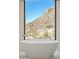 Soaking tub with a mountain view at 5000 N Camelback Ridge Dr # 203, Scottsdale, AZ 85251