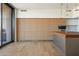 Open kitchen with stainless steel appliances and a connecting balcony at 5000 N Camelback Ridge Dr # 203, Scottsdale, AZ 85251