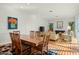 Open concept living space with fireplace, hardwood floors and natural light at 5642 N Scottsdale Rd, Paradise Valley, AZ 85253