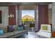 Cozy living space with access to a balcony featuring stunning views of the nearby mountain at 6850 E Main St # 4416, Scottsdale, AZ 85251