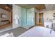 Bright bathroom features a modern soaking tub, glass-enclosed shower, and double vanity sinks at 6850 E Main St # 4416, Scottsdale, AZ 85251