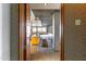 Inviting entryway featuring modern design with an open staircase and a glimpse of the stylish kitchen beyond at 6850 E Main St # 4416, Scottsdale, AZ 85251