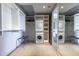 Well-organized laundry room with washer, dryer, and ample storage space at 6850 E Main St # 4416, Scottsdale, AZ 85251