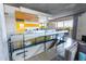 Modern open-concept living space with stylish railings, concrete ceiling, and large windows at 6850 E Main St # 4416, Scottsdale, AZ 85251