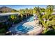 Inviting pool area surrounded by swaying palm trees, perfect for relaxation and enjoying sunny days at 6850 E Main St # 4416, Scottsdale, AZ 85251