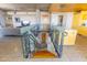 Modern staircase with glass railings, connecting multiple levels of the home at 6850 E Main St # 4416, Scottsdale, AZ 85251
