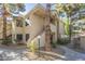 A view of the condominium's exterior and a pathway leading to an entrance at 6885 E Cochise Rd # 219, Paradise Valley, AZ 85253