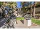 Community grilling area features well-kept outdoor grills with a landscaped outdoor seating area at 6885 E Cochise Rd # 219, Paradise Valley, AZ 85253