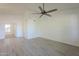 Living room with vaulted ceiling and wood floors at 6885 E Cochise Rd # 219, Paradise Valley, AZ 85253