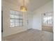 Bright living area with modern flooring, neutral walls, and natural lighting at 6885 E Cochise Rd # 219, Paradise Valley, AZ 85253