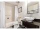 Bright bathroom featuring a shower and tub combination, complemented by a modern vessel sink and vanity at 7920 E Camelback Rd # 408, Scottsdale, AZ 85251