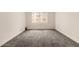 Empty bedroom with a window and neutral carpet at 7920 E Camelback Rd # 408, Scottsdale, AZ 85251