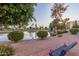 Picturesque pond with fountain, surrounded by greenery and seating area, perfect for relaxation at 7920 E Camelback Rd # 408, Scottsdale, AZ 85251