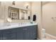 Modern bathroom vanity with marble countertops and a large mirror at 8082 E Via Del Vencino --, Scottsdale, AZ 85258