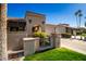 Charming home featuring desert landscaping, stucco walls, and a barrel tile roof at 8082 E Via Del Vencino --, Scottsdale, AZ 85258